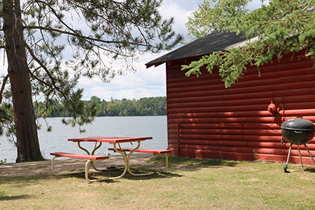red cabin with water skis