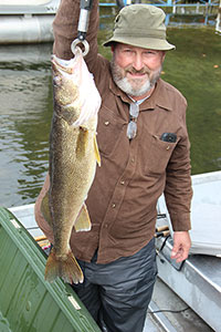 man catches fish