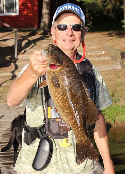 woman catches fish